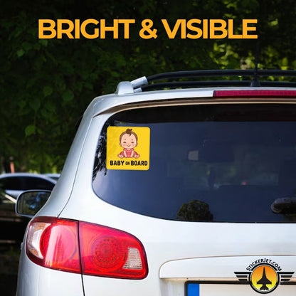 Car with a Baby On Board Sticker – Cartoon Baby Girl Design on the rear window, with text 'BRIGHT & VISIBLE' above