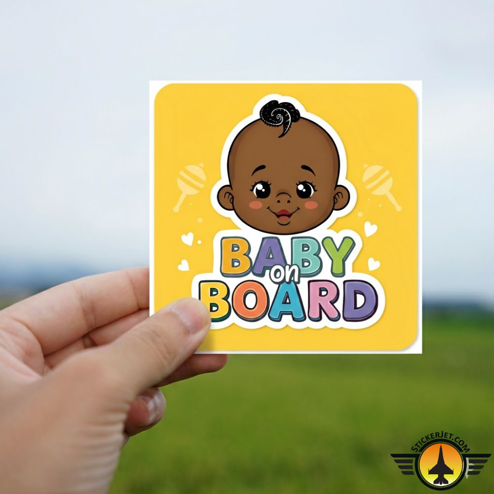 Hand holding a Baby On Board Sticker – Playful Rainbow Text Design with a colorful design against a blurred natural background.
