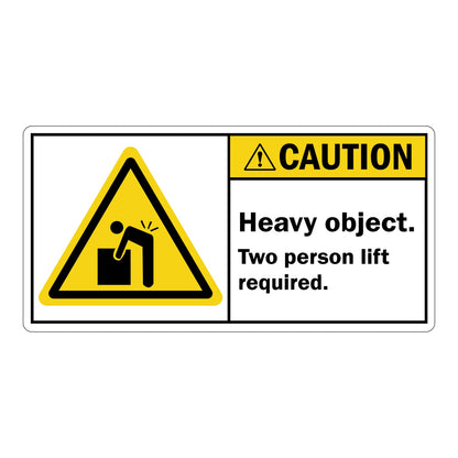 ANSI Caution Heavy Object Two Person Lift Required Sign Sticker featuring a yellow caution header, person lifting heavy box triangle symbol, and bold two person lift requirement text.