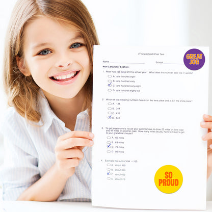 Child holding a math test with 'Great Job' and 'So Proud' Encouraging sticker.
