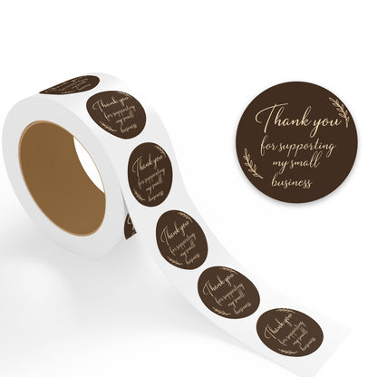 Roll of brown stickers with 'Thank you for supporting my small business' text on a white background