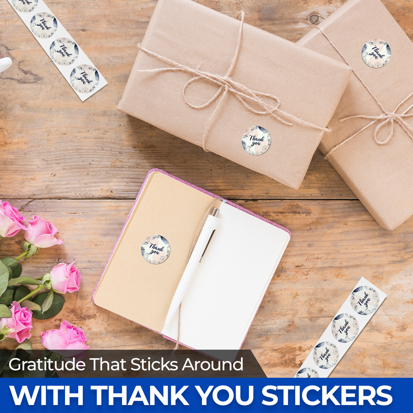 Notebook, wrapped gifts, and flowers with 'thank you' stickers on a wooden surface.
